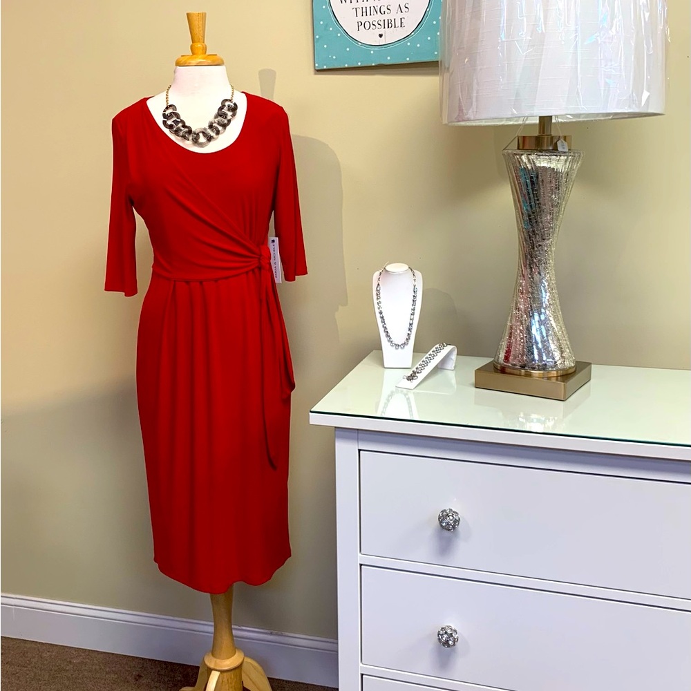 New with tags. Emma and Michele red poly/spandex